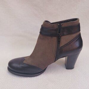 Sturdy leather short boot . New and unworn.